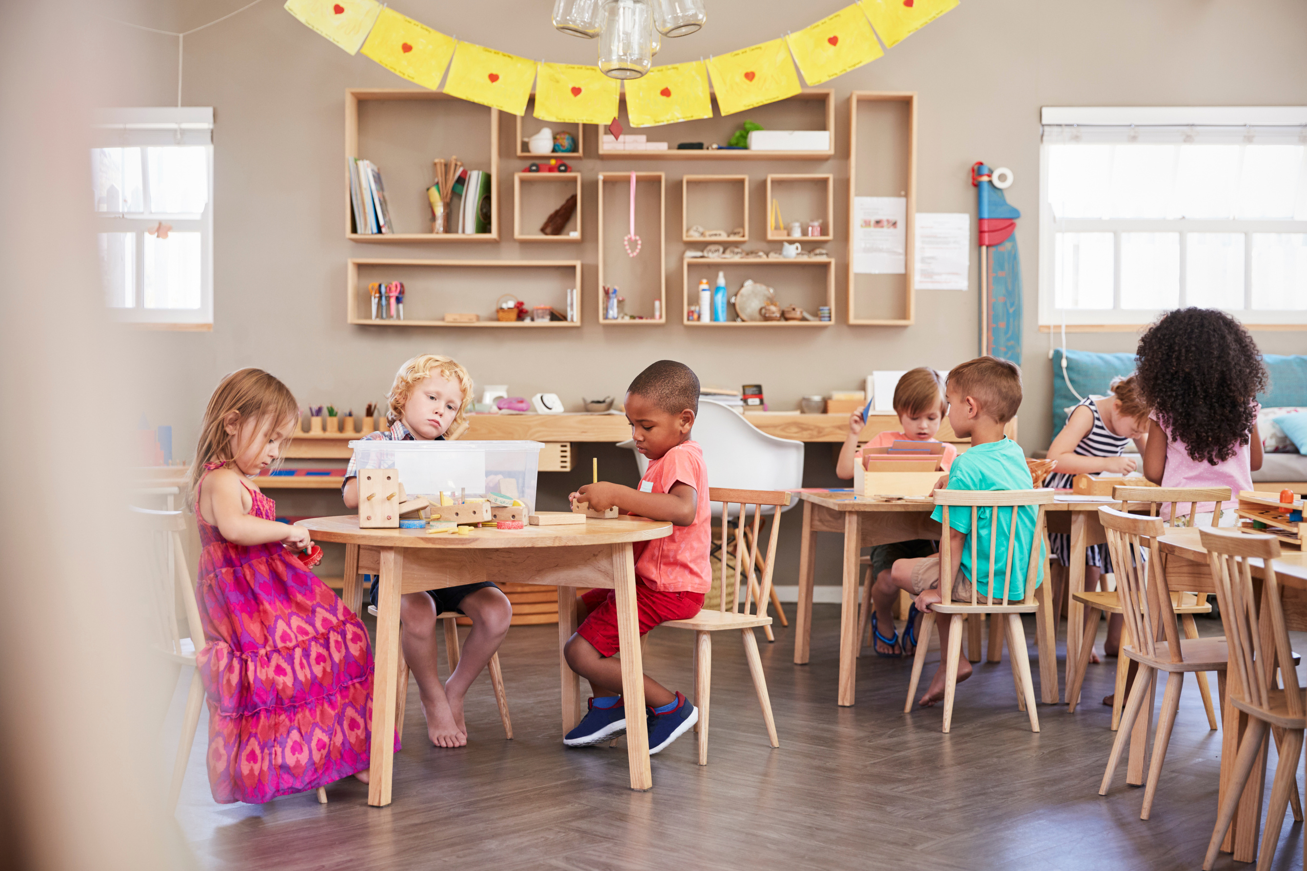 Wide Angle Shot of Pupils Working at Tables
